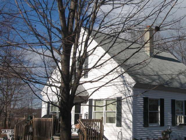 35 Jennings Road Kent, CT 06785 - Photo 1 of 1 a tree in the middle of a house
