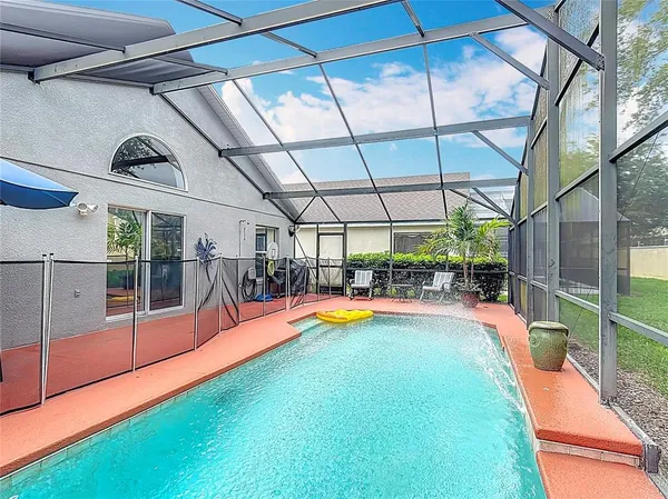 a view of a swimming pool with a porch
