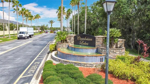 a view of a swimming pool with a fountain