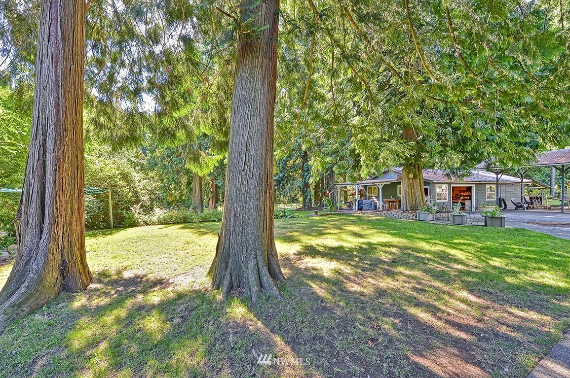 1177 West Axton Road Ferndale, WA 98248 - Photo 5 of 31 a view of a house with a yard