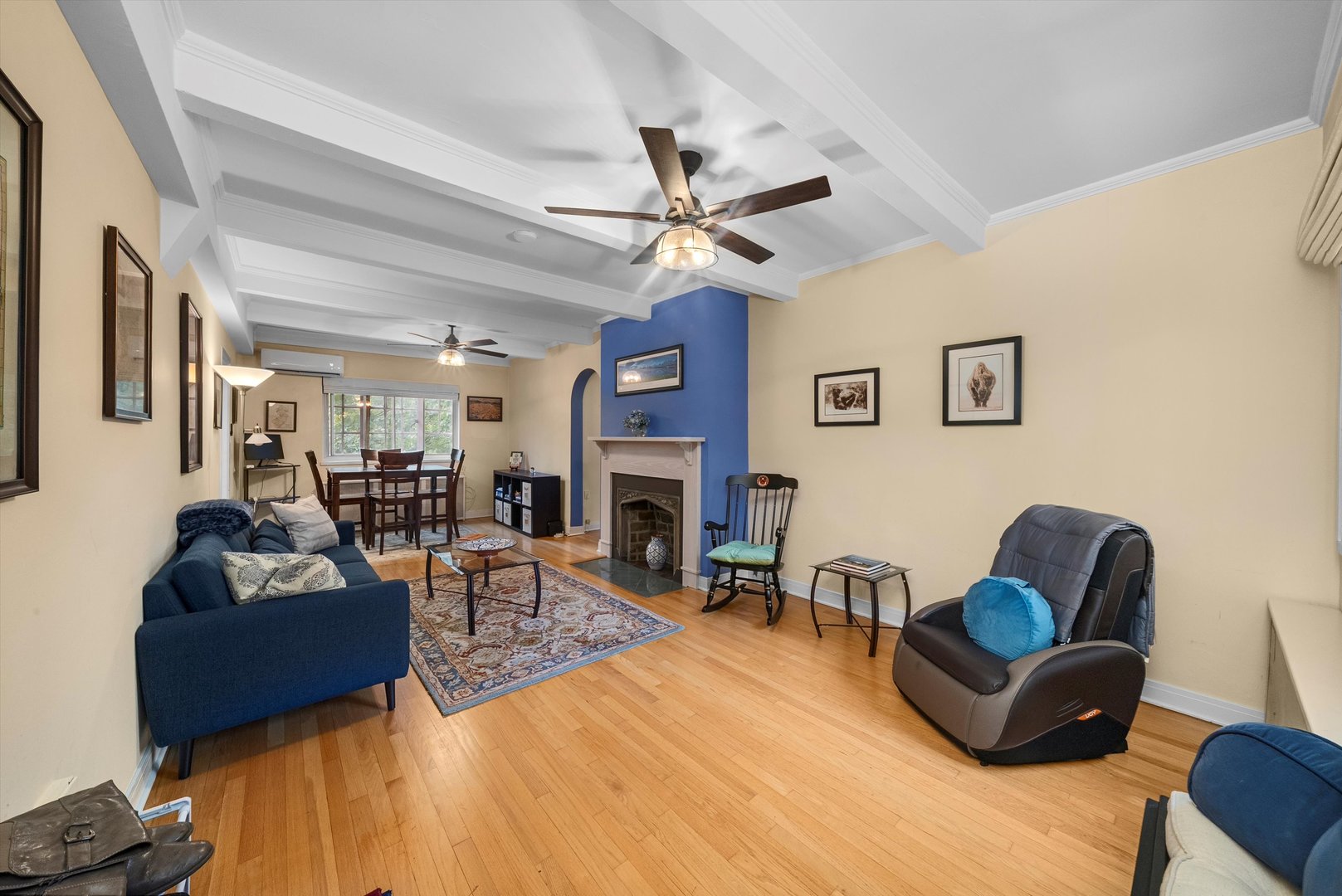 1157 East 56th Street, Unit 3 Chicago, IL 60637 - Photo 3 of 14 a living room with fireplace furniture and a fireplace