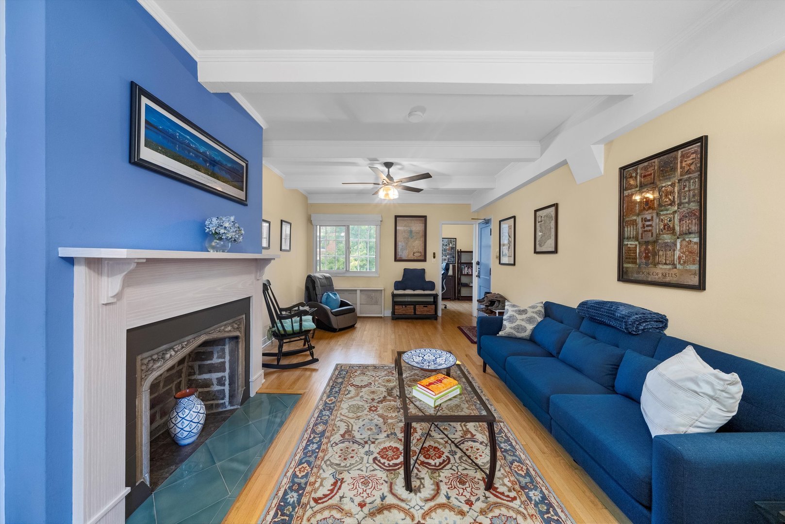 1157 East 56th Street, Unit 3 Chicago, IL 60637 - Photo 4 of 14 a living room with furniture fireplace and window