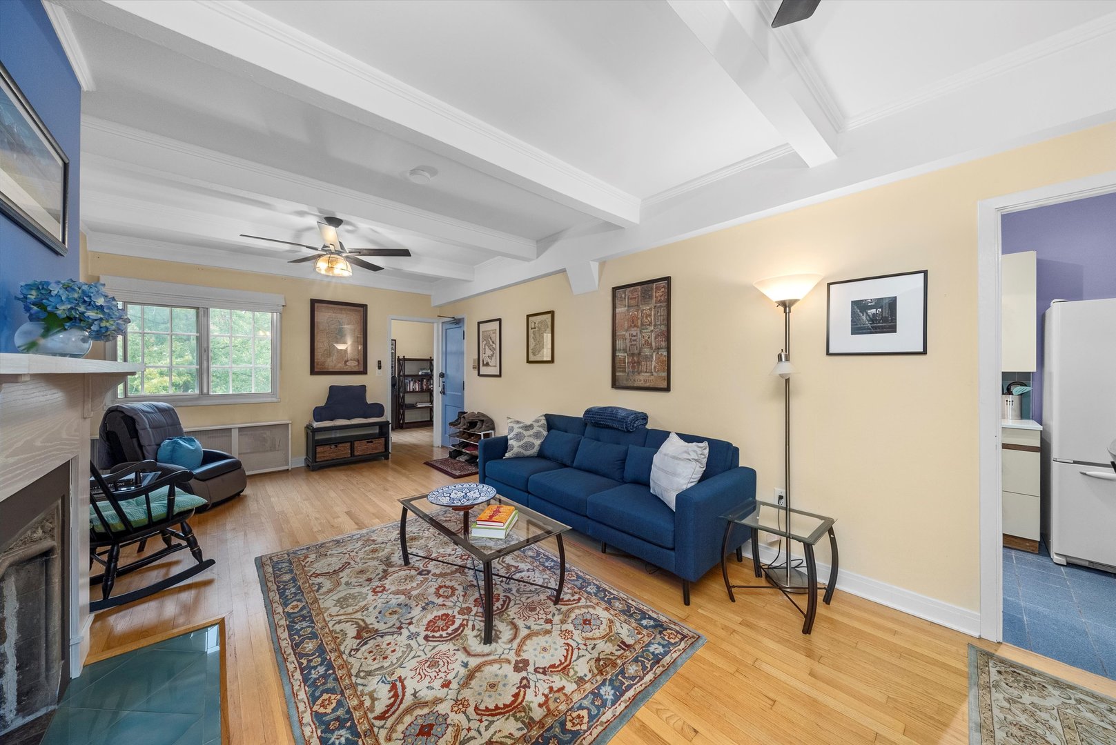 1157 East 56th Street, Unit 3 Chicago, IL 60637 - Photo 5 of 14 a living room with furniture and a window