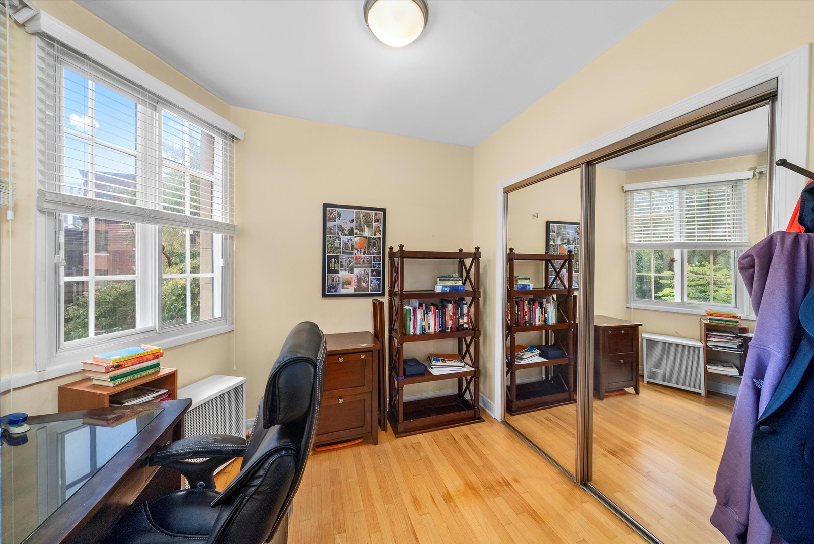 1157 East 56th Street, Unit 3 Chicago, IL 60637 - Photo 9 of 14 a view of a workspace with furniture and a window