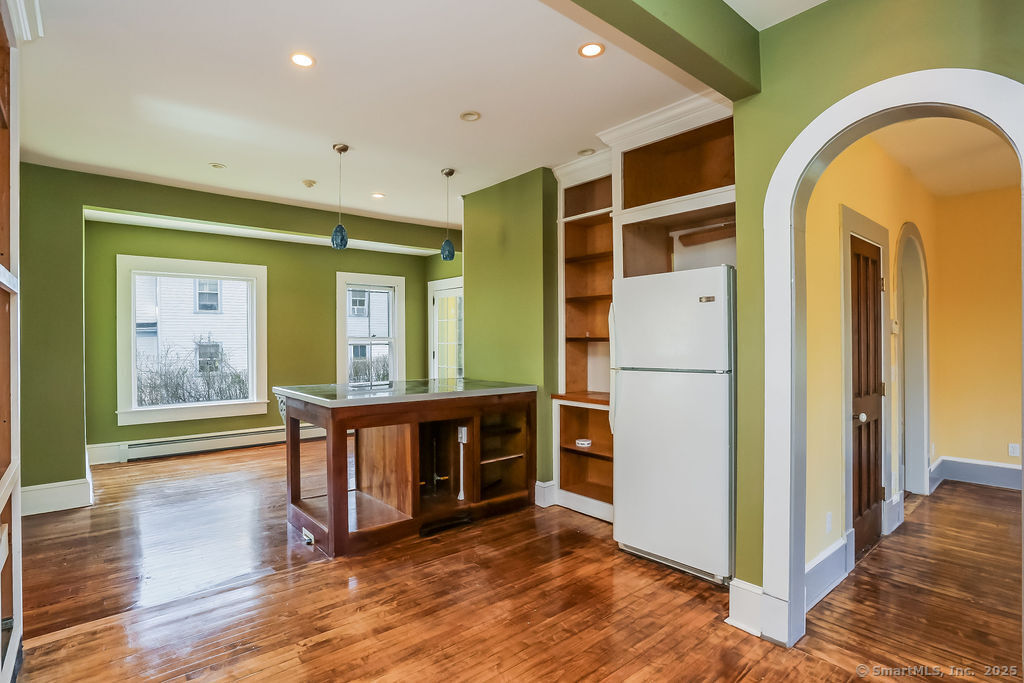 220 Walnut Street Winchester, CT 06098 - Photo 11 of 20 a view of livingroom with furniture and wooden floor