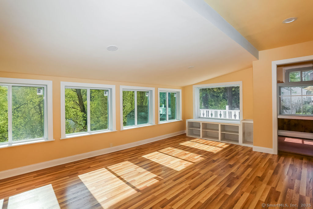 220 Walnut Street Winchester, CT 06098 - Photo 13 of 20 a view of a livingroom with wooden floor and a window