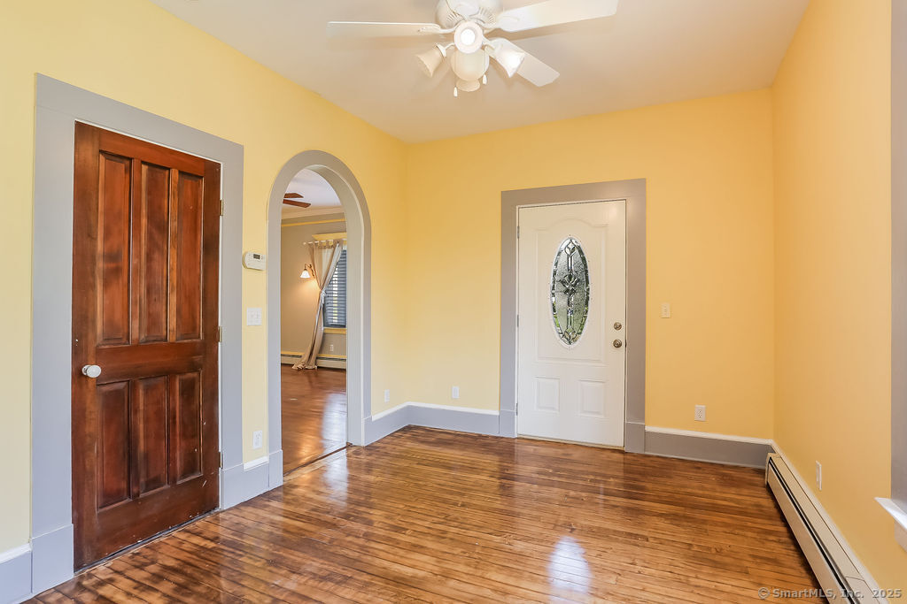 220 Walnut Street Winchester, CT 06098 - Photo 7 of 20 a view of empty room with wooden floor