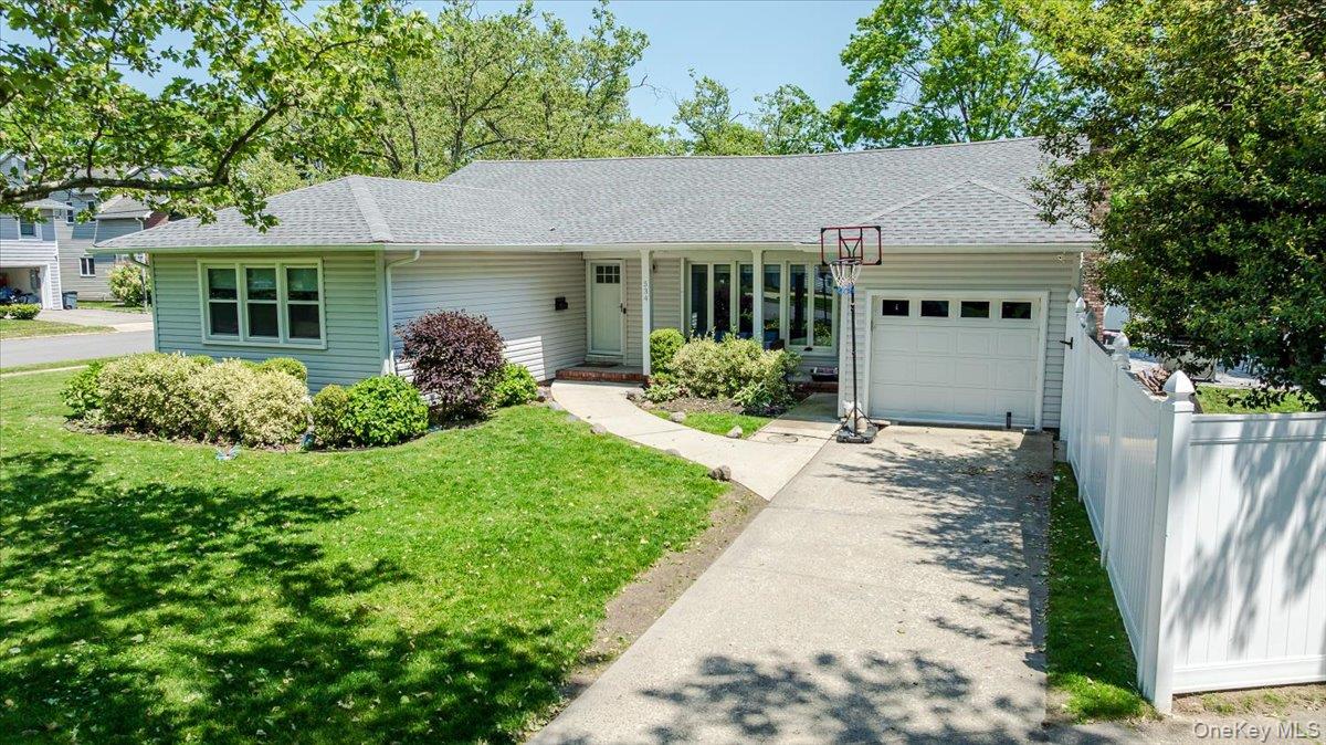 534 Allen Road Woodmere, NY 11598 - Photo 2 of 35 a view of a house with garden and plants