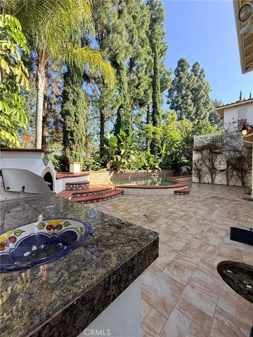 a view of a swimming pool with an outdoor space