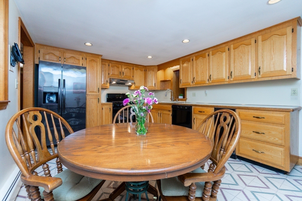 66 Depot Street Easton, MA 02375 - Photo 11 of 40 a view of a dining room with furniture