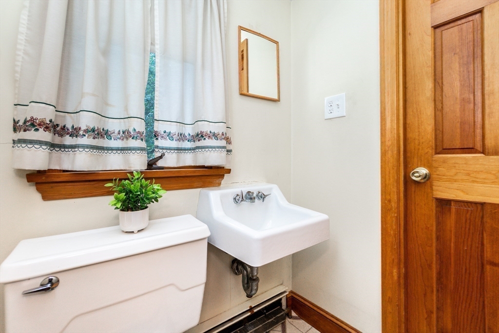 66 Depot Street Easton, MA 02375 - Photo 27 of 40 a bathroom with a sink and a mirror