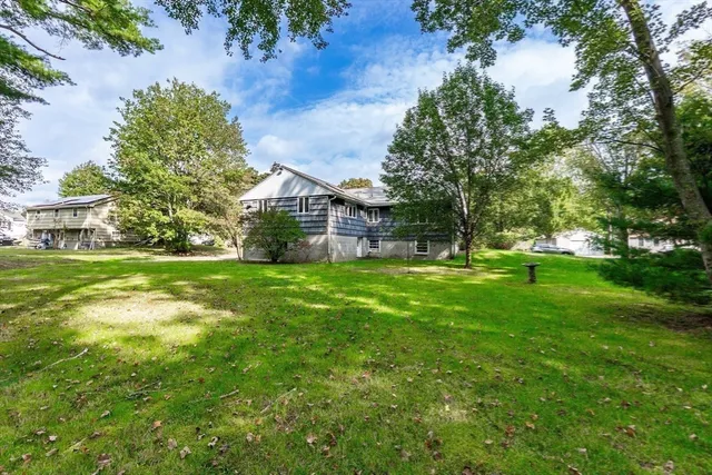 a view of house with garden
