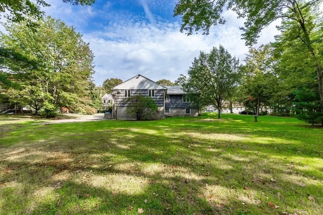 a view of a house with a big yard