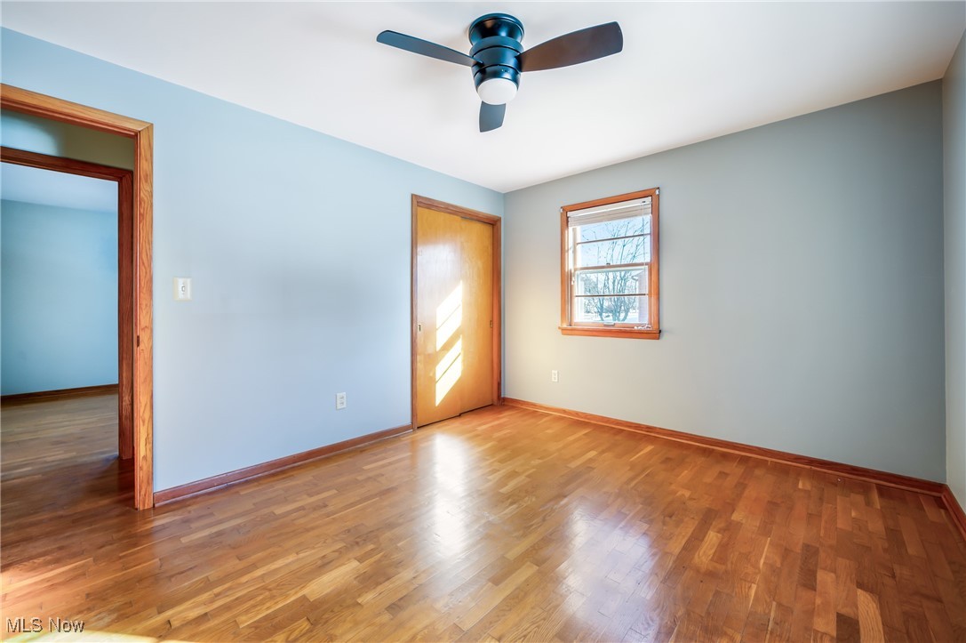 3210 Oser Road Norton, OH 44203 - Photo 36 of 47 Unfurnished room with ceiling fan and light wood-type flooring
