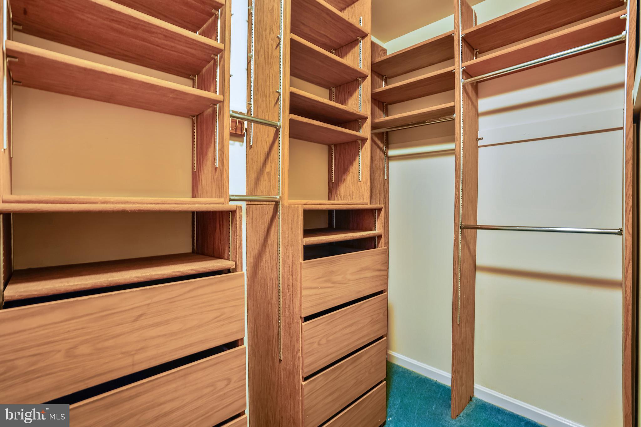 10412 Samaga Drive Oakton, VA 22124 - Photo 15 of 38 Primary walk-in closet, Built-ins