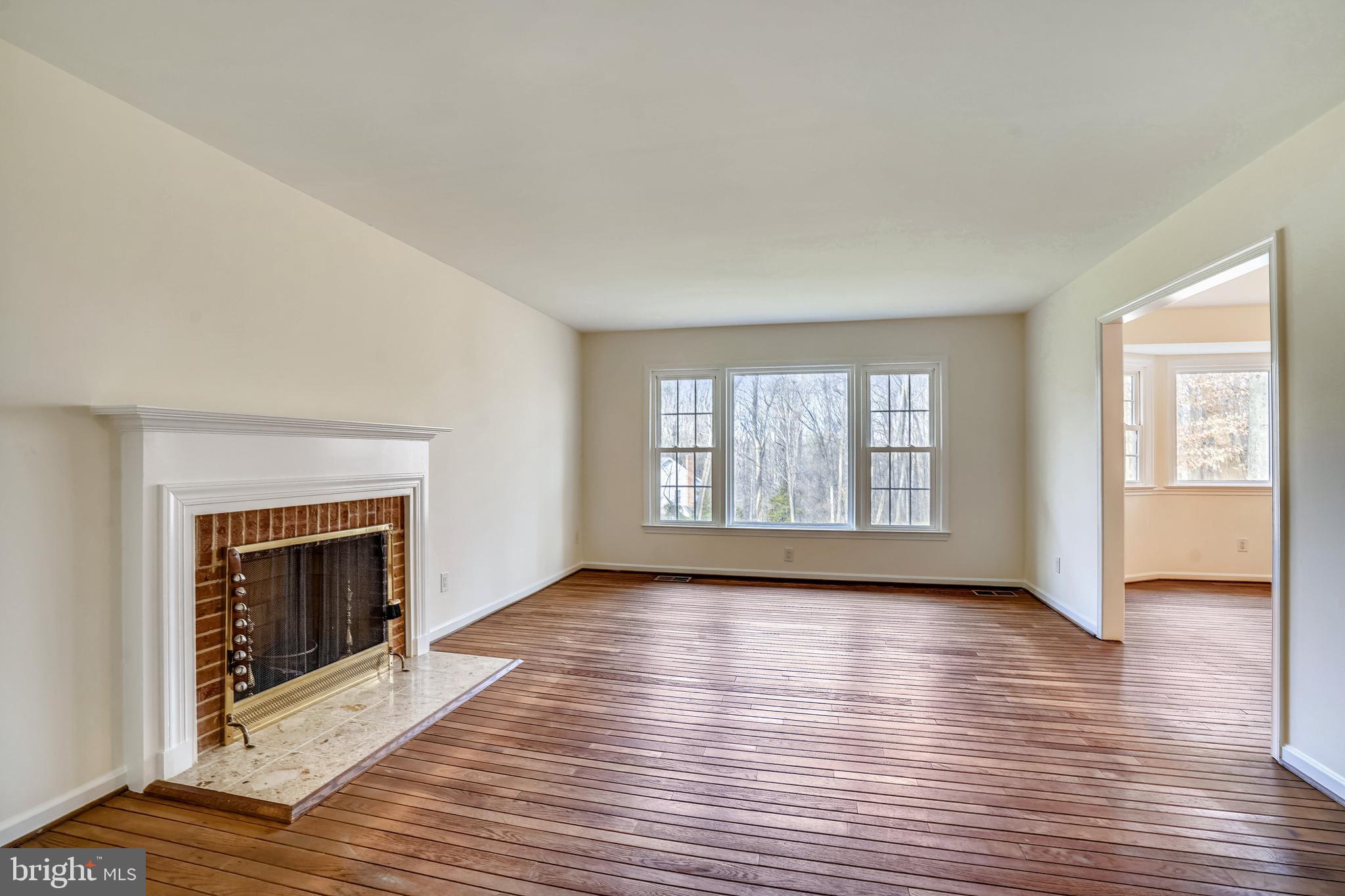 10412 Samaga Drive Oakton, VA 22124 - Photo 7 of 38 Living Room w/Wood floors, wood burning fireplace