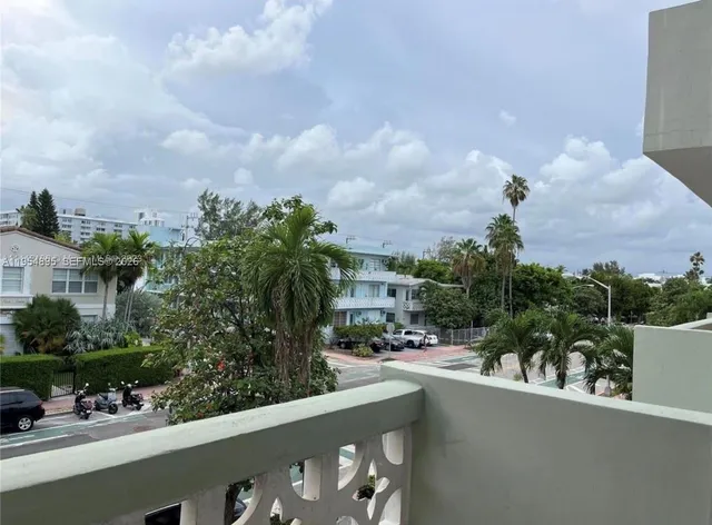 a room with a washing machine and a table