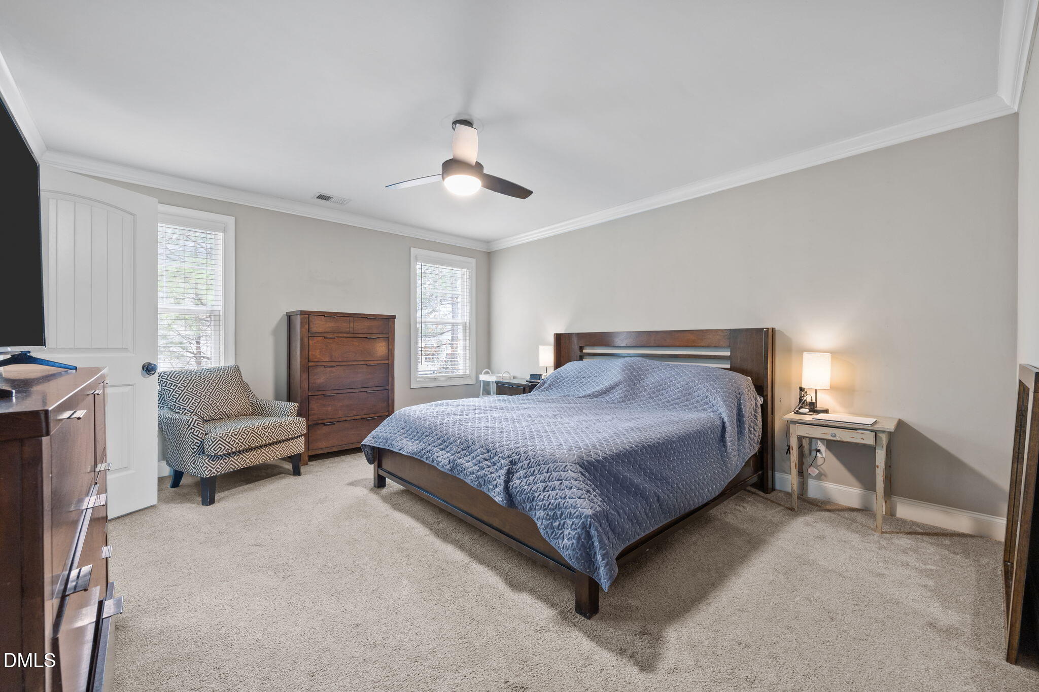 3724 Massey Ridge Court Raleigh, NC 27616 - Photo 12 of 30 a spacious bedroom with a bed and a couch