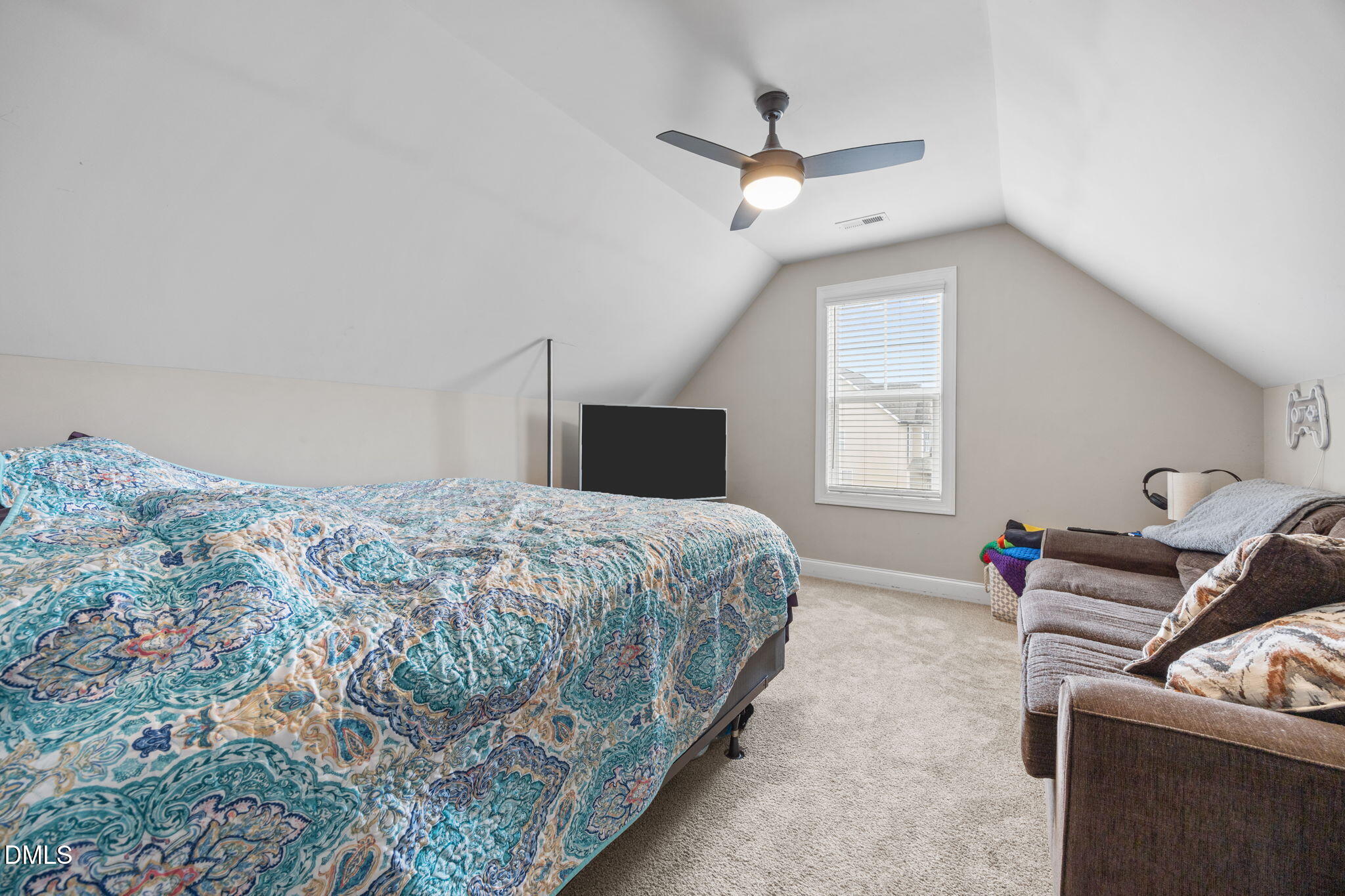 3724 Massey Ridge Court Raleigh, NC 27616 - Photo 17 of 30 a bedroom with a bed and window