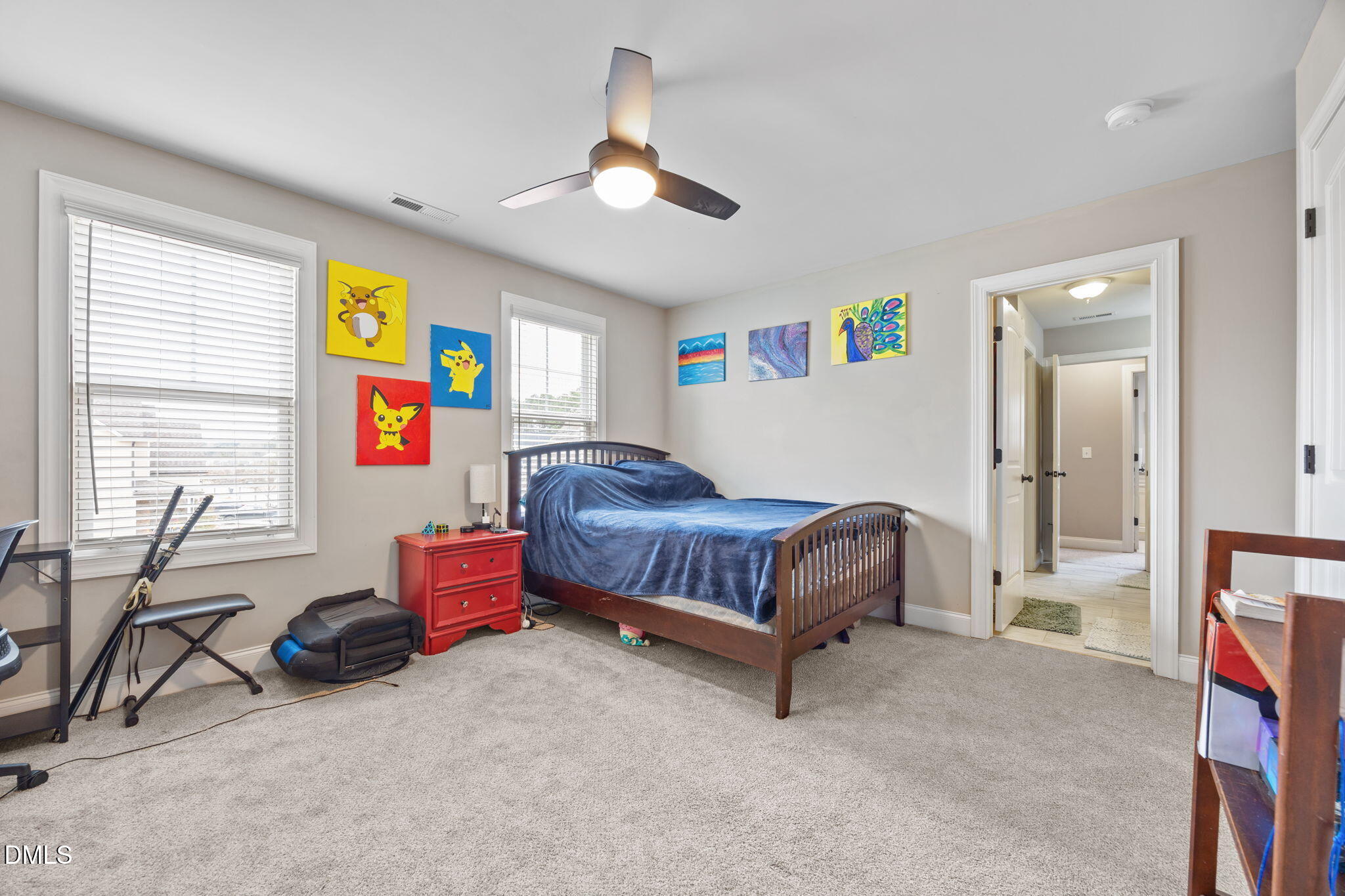 3724 Massey Ridge Court Raleigh, NC 27616 - Photo 19 of 30 a bedroom with a bed a couch and a window