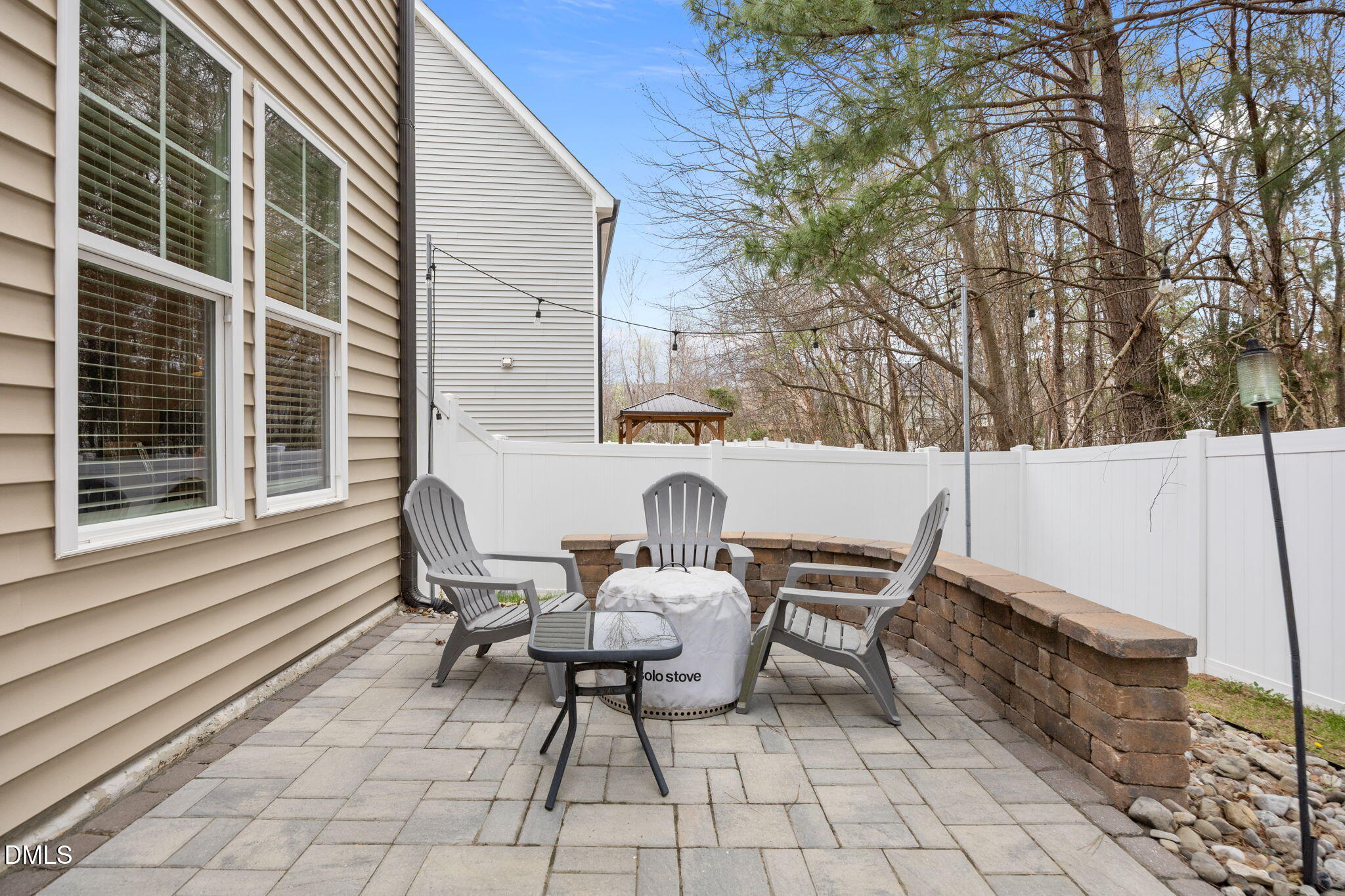 3724 Massey Ridge Court Raleigh, NC 27616 - Photo 24 of 30 a view of a patio with a table and chairs and a barbeque