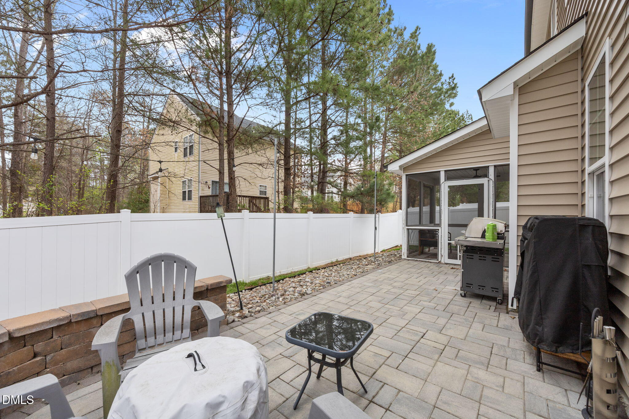 3724 Massey Ridge Court Raleigh, NC 27616 - Photo 25 of 30 a view of a patio with two chairs and a table