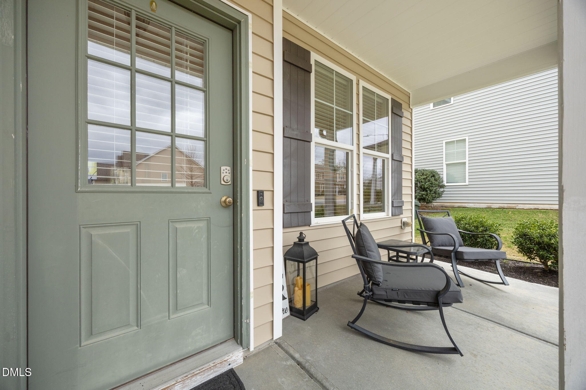 3724 Massey Ridge Court Raleigh, NC 27616 - Photo 27 of 30 a balcony with couple of chairs and a window