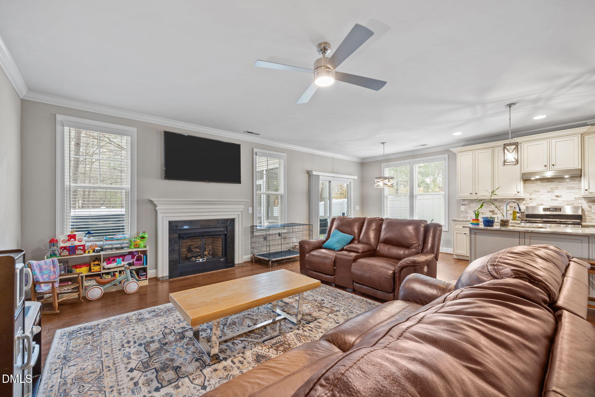 3724 Massey Ridge Court Raleigh, NC 27616 - Photo 9 of 30 a living room with furniture or couch and a fireplace