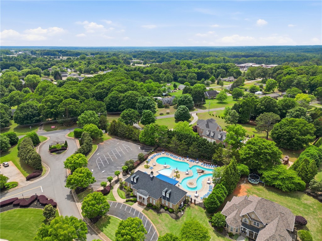 138 Buckland Drive Anderson, SC 29621 - Photo 46 of 49 An aerial view showcases a vibrant community with lush landscaping and a resort-style pool.