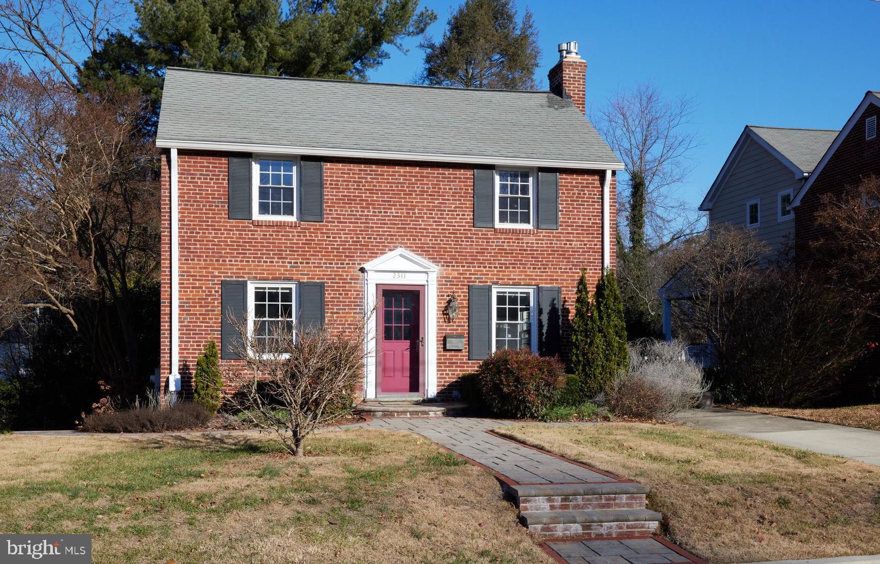 a front view of house with yard