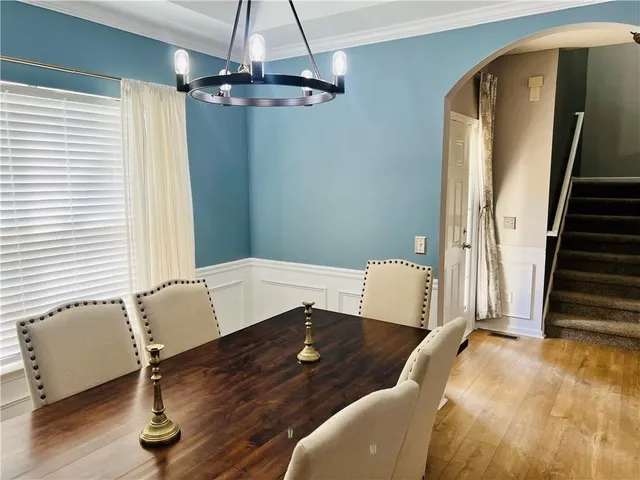 a workspace with furniture and window