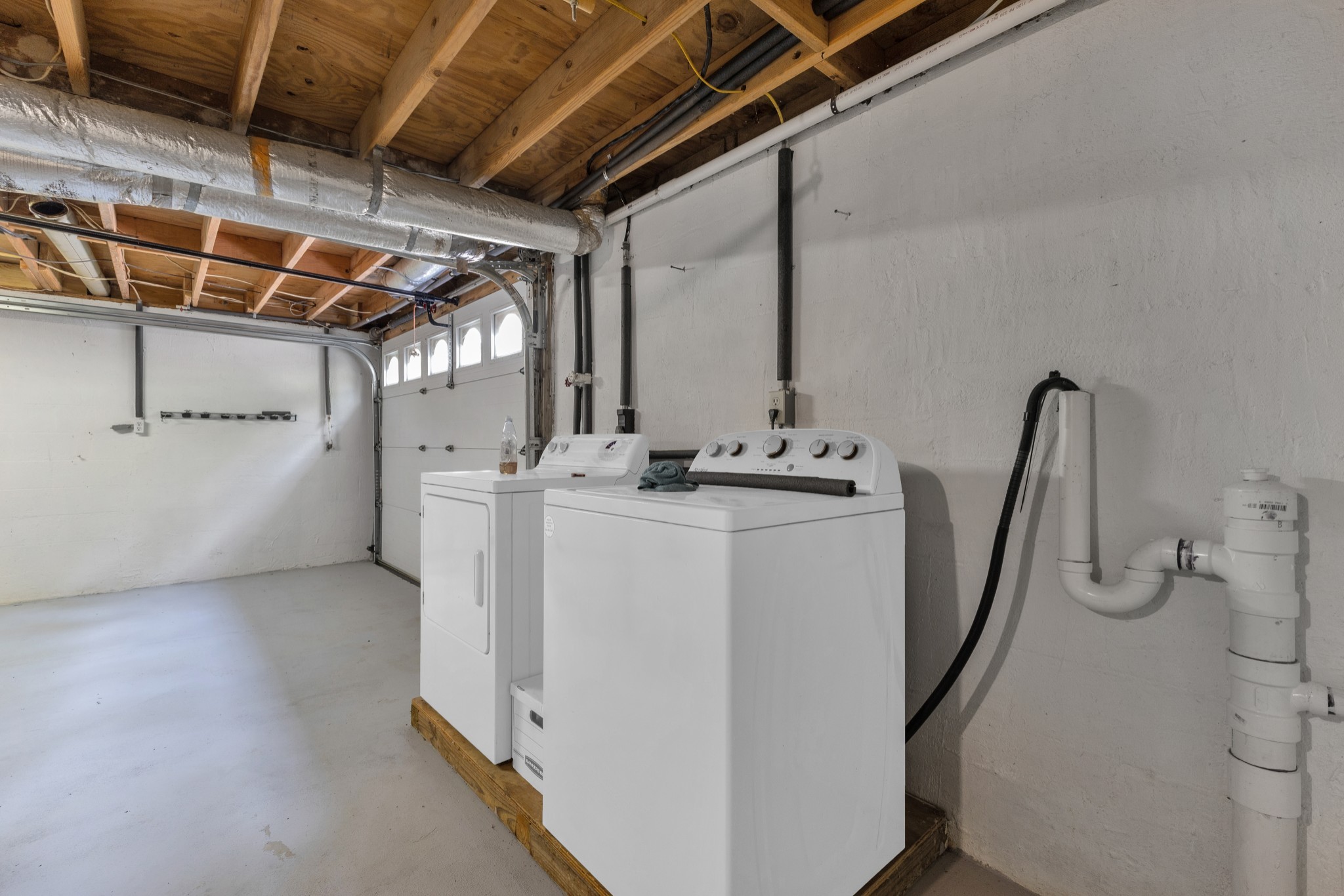 123 Lower Roans Creek Road Linden, TN 37096 - Photo 33 of 33 a utility room with dryer and washer