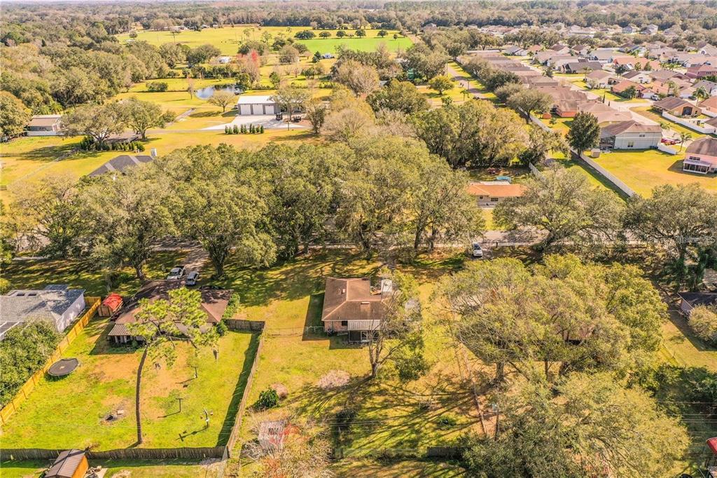 8510 North Campbell Road Lakeland, FL 33810 - Photo 3 of 15 a view of residential houses with swimming pool