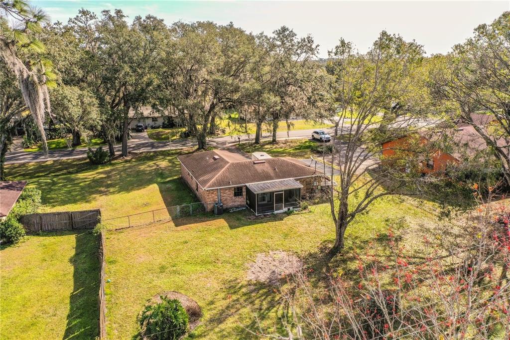 8510 North Campbell Road Lakeland, FL 33810 - Photo 4 of 15 a view of a swimming pool with an outdoor space and seating area