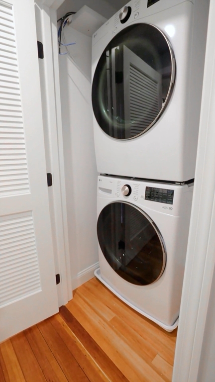 663 Columbia Road, Unit 1 Boston, MA 02125 - Photo 4 of 12 a utility room with dryer and washer