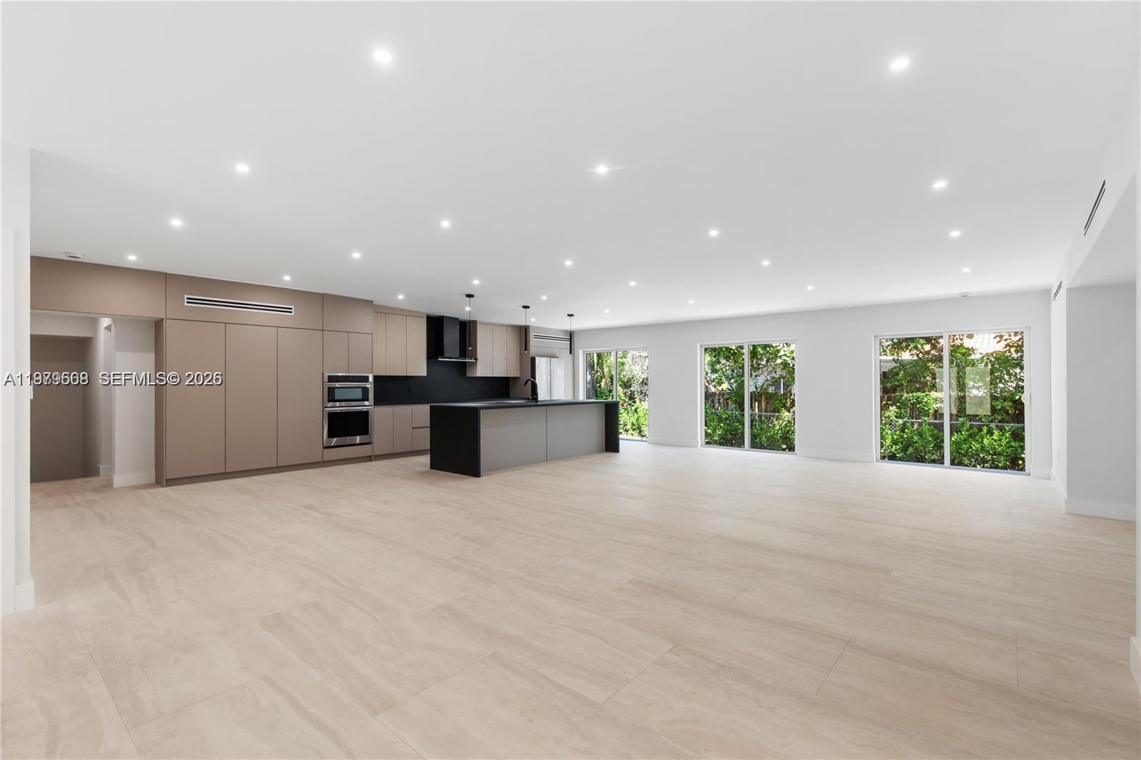 a view of an empty room with a stove