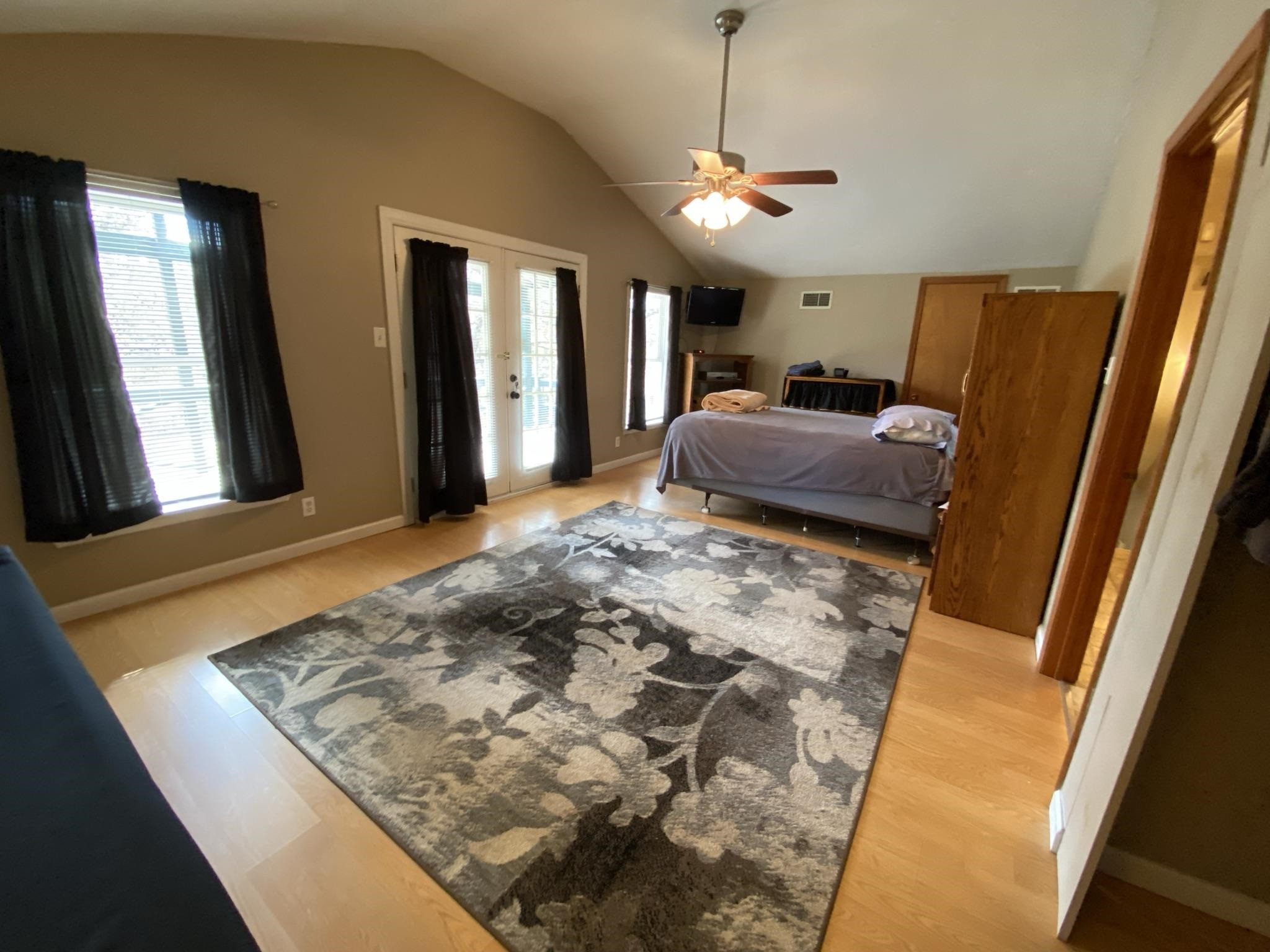 3520 Silerton Road Henderson, TN 38340 - Photo 12 of 24 a bedroom with a bed and a mirror