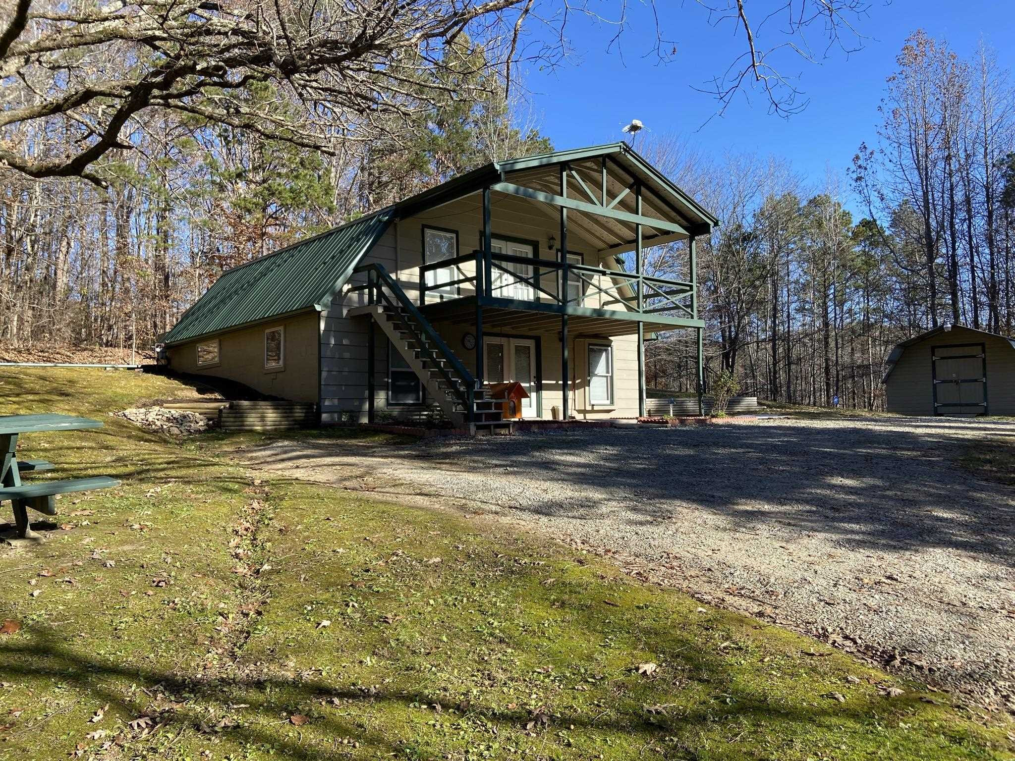 3520 Silerton Road Henderson, TN 38340 - Photo 16 of 24 a view of a house with a yard