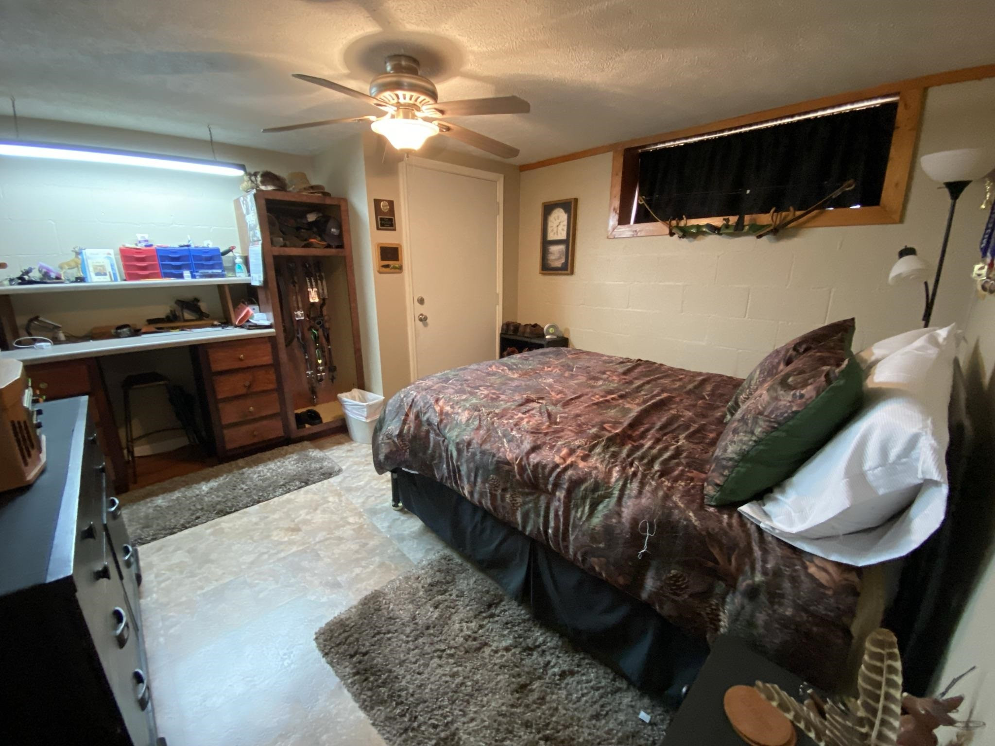 3520 Silerton Road Henderson, TN 38340 - Photo 6 of 24 a bed room with a bed and a television