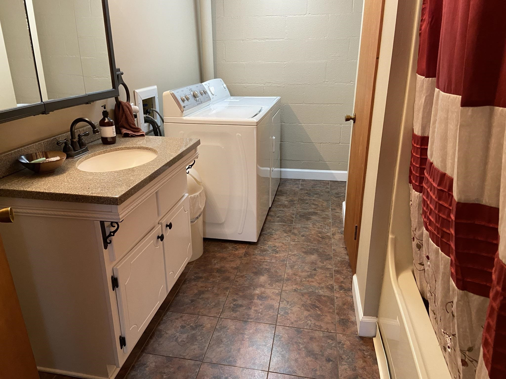 3520 Silerton Road Henderson, TN 38340 - Photo 8 of 24 a bathroom with a sink and a mirror