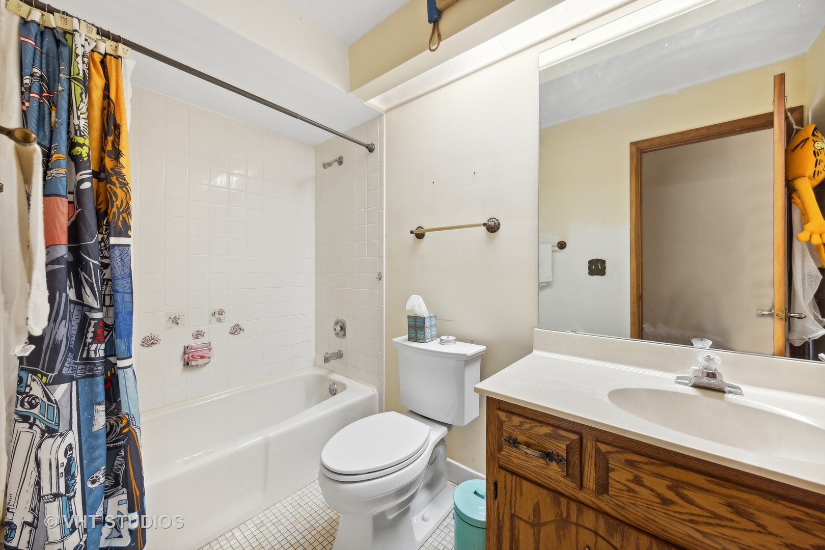 6685 Breckenridge Road Lisle, IL 60532 - Photo 11 of 18 a bathroom with a sink toilet and shower