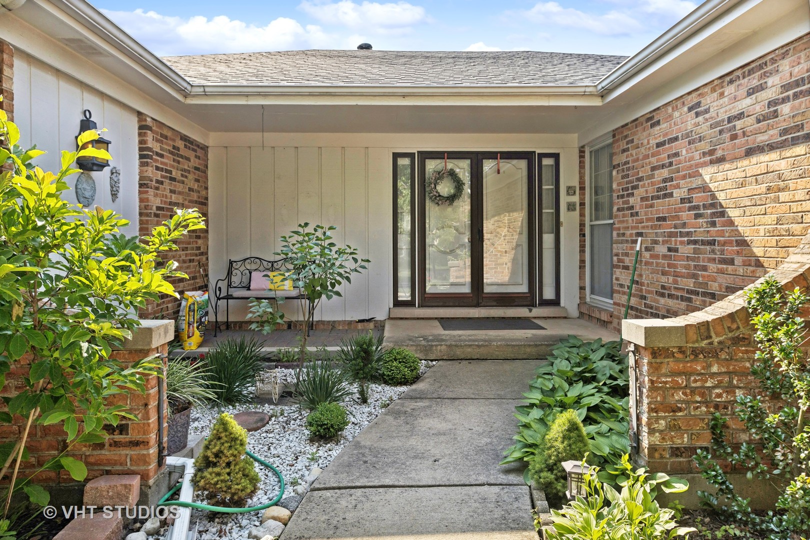 6685 Breckenridge Road Lisle, IL 60532 - Photo 3 of 18 a front view of a house with a porch