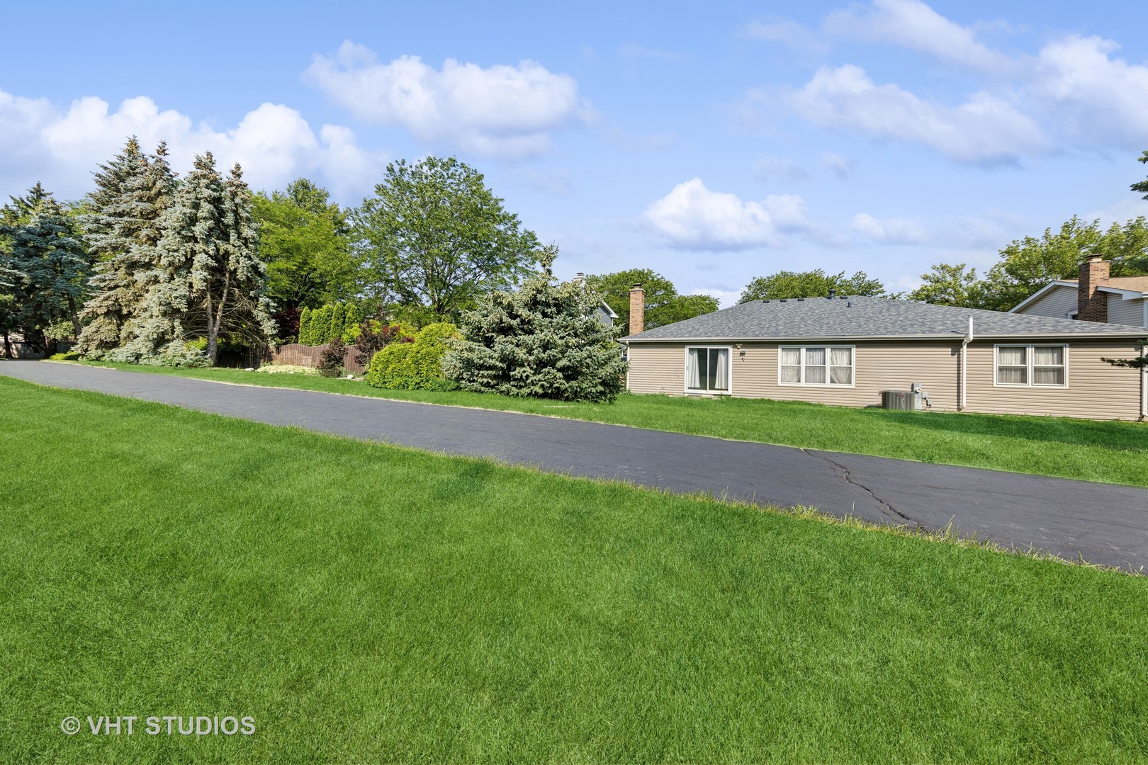 6685 Breckenridge Road Lisle, IL 60532 - Photo 4 of 18 a house view with garden space and trees