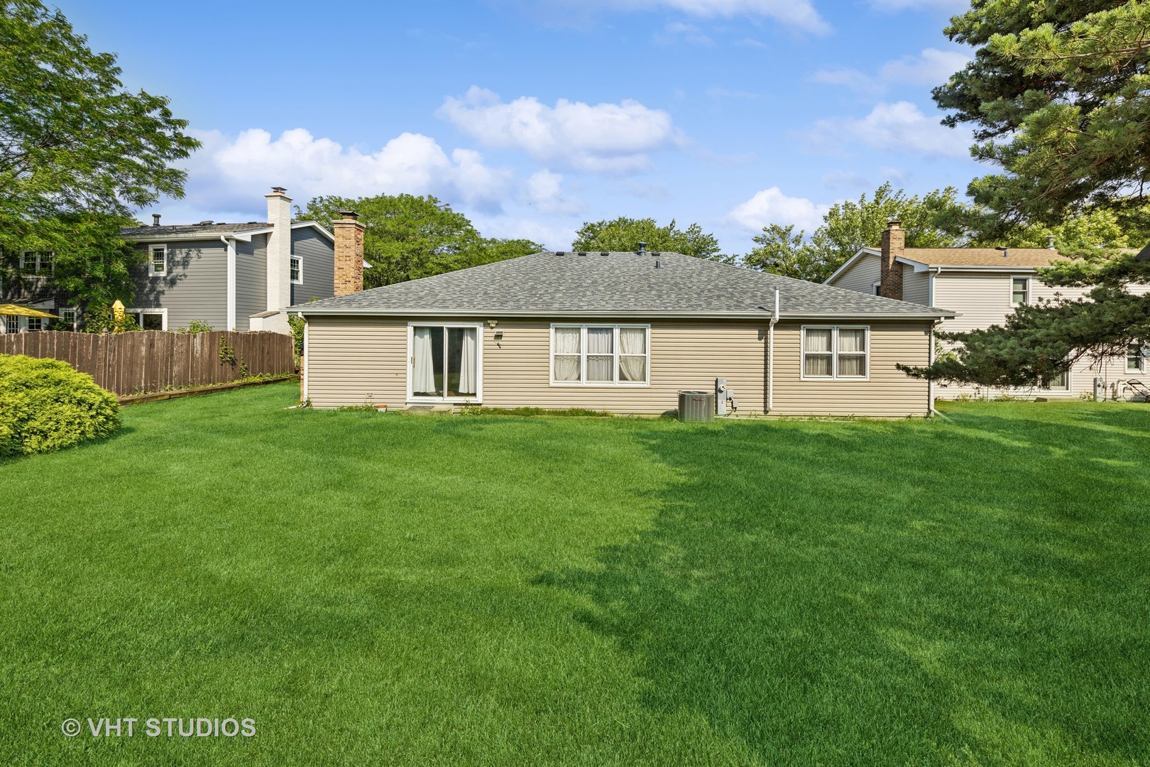 6685 Breckenridge Road Lisle, IL 60532 - Photo 5 of 18 a front view of a house with a garden