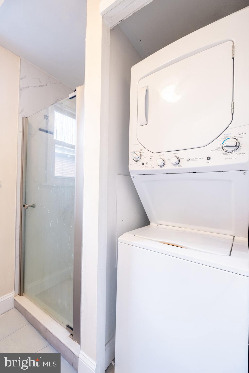 1736 Pine Street, Unit 3R Philadelphia, PA 19103 - Photo 10 of 14 a utility room with dryer and washer