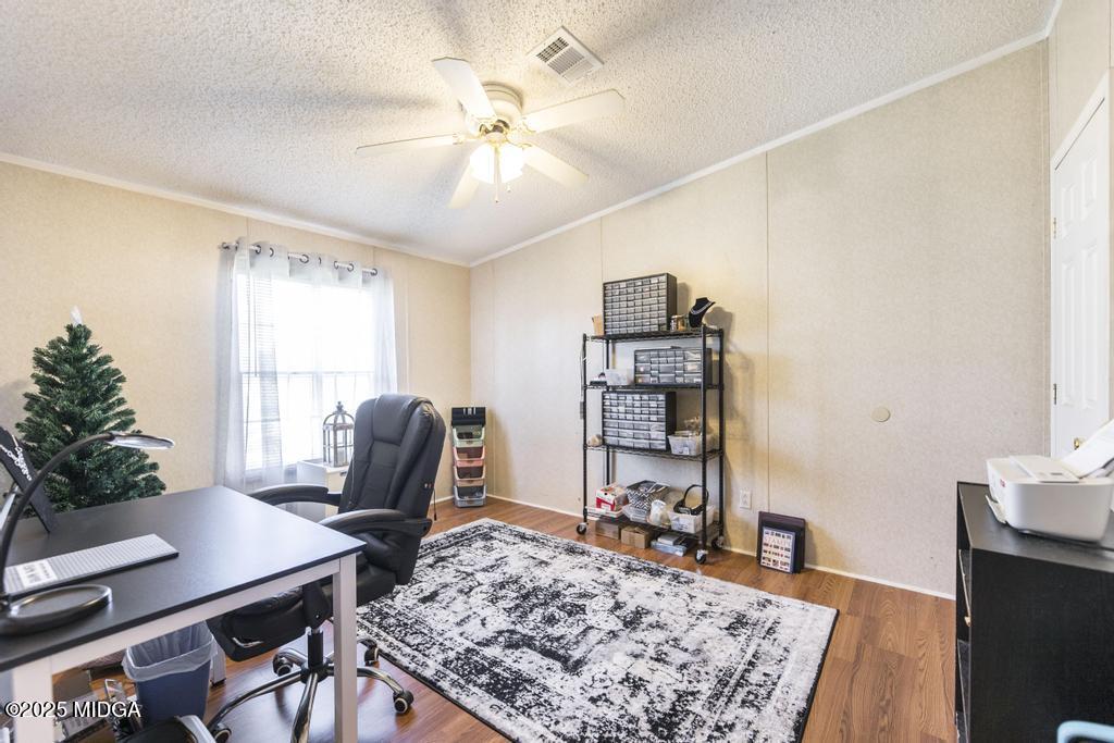 100 Coventry Manor Court Byron, GA 31008 - Photo 22 of 29 a view of a workspace with furniture and a rug