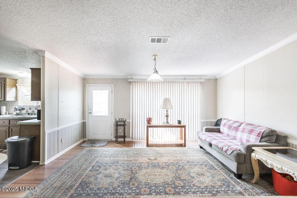 100 Coventry Manor Court Byron, GA 31008 - Photo 9 of 29 a bedroom with a bed and a dresser in it