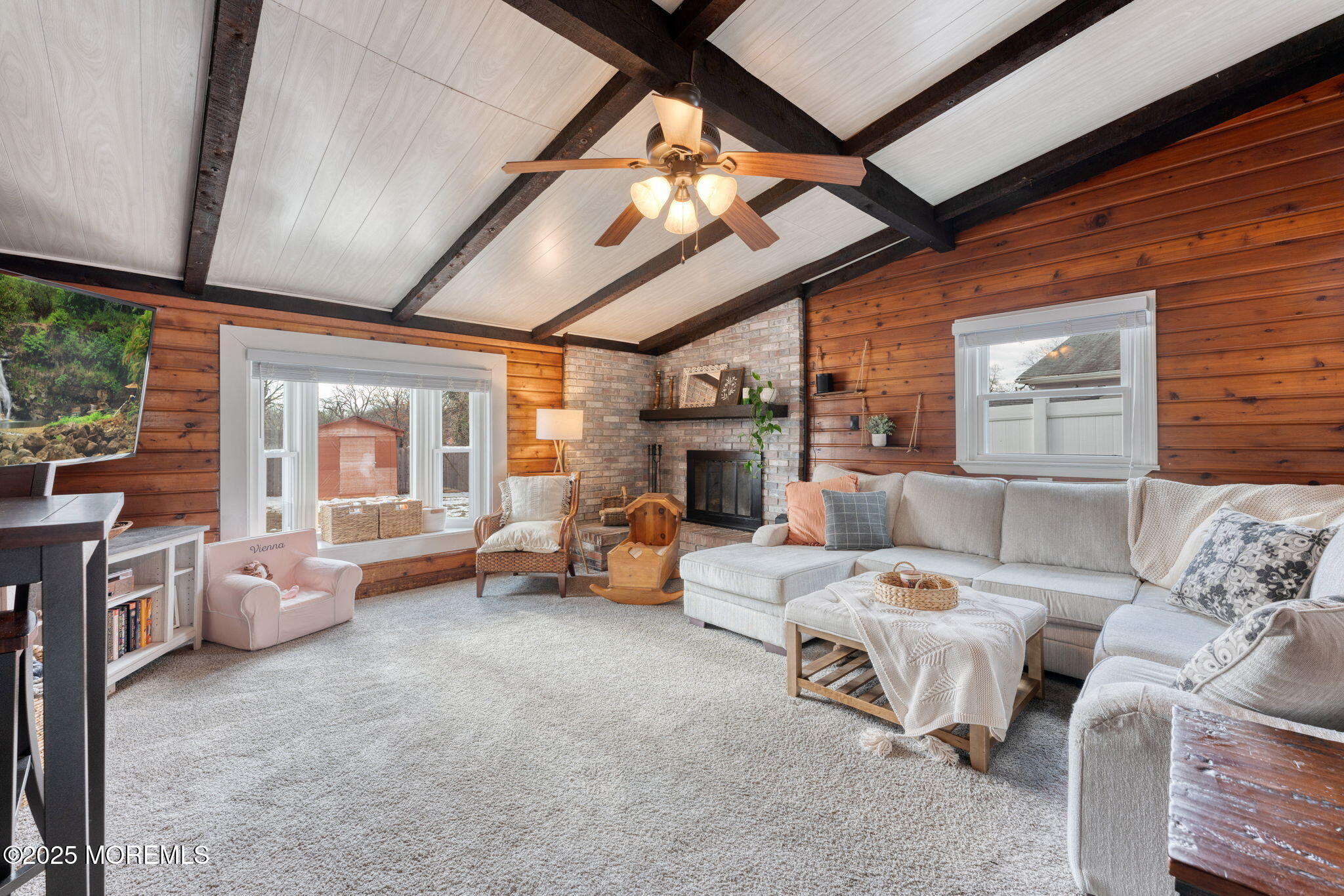 332 Maple Road Mount Laurel, NJ 08054 - Photo 11 of 21 a living room with furniture large window and a fireplace