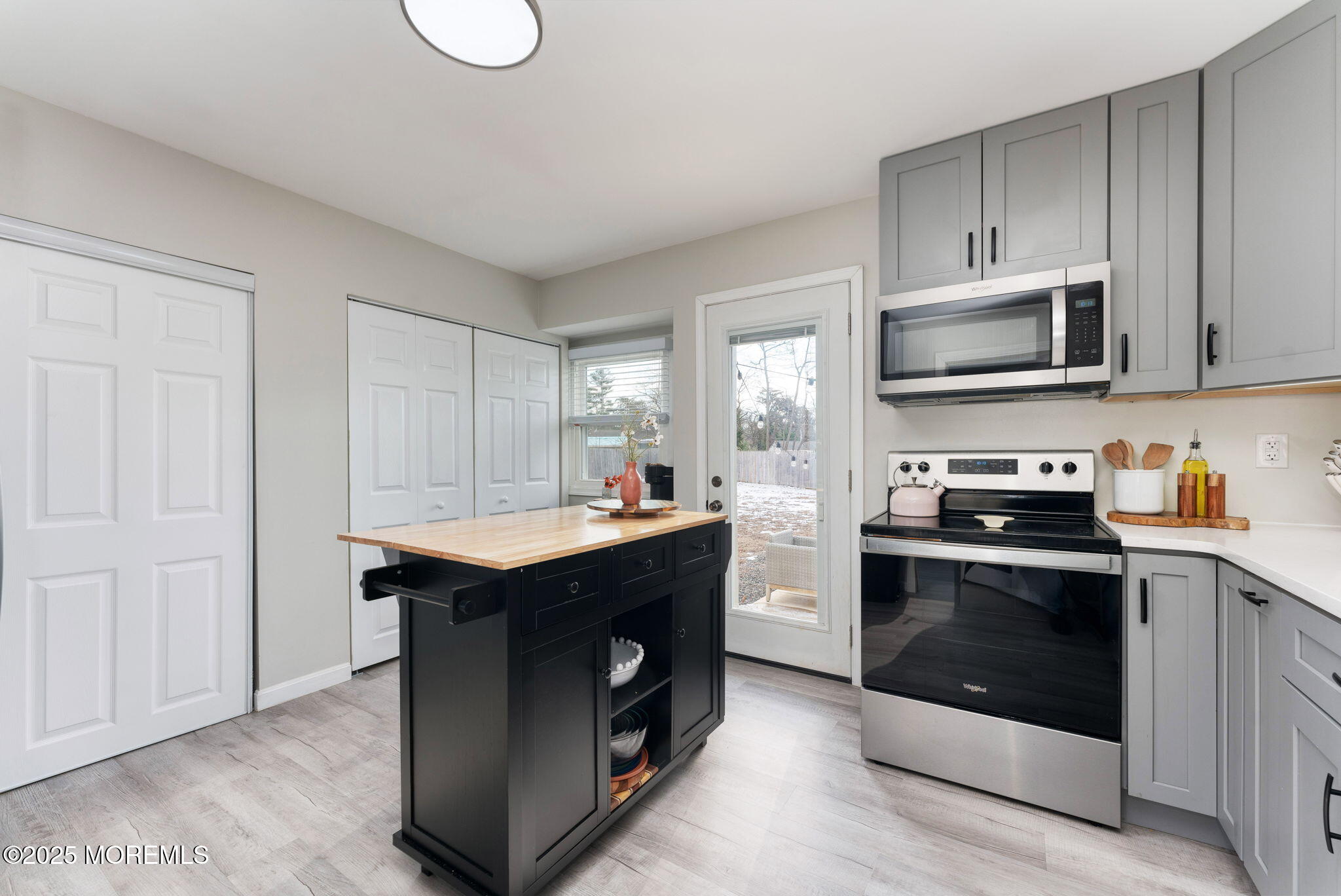 332 Maple Road Mount Laurel, NJ 08054 - Photo 8 of 21 a kitchen with granite countertop a stove and a microwave
