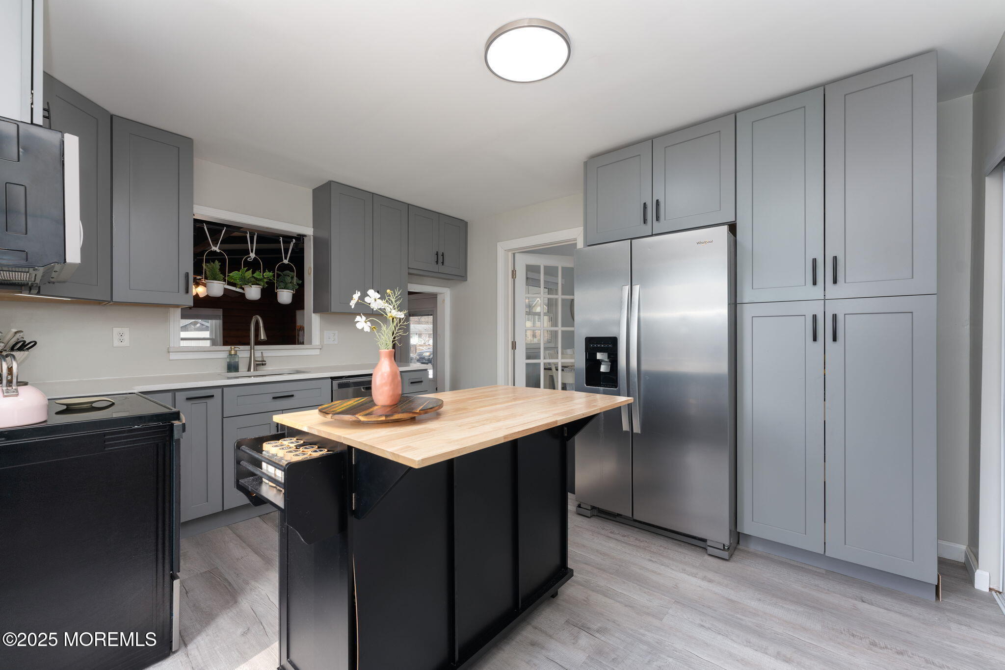 332 Maple Road Mount Laurel, NJ 08054 - Photo 10 of 21 a kitchen with stainless steel appliances granite countertop a sink dishwasher a refrigerator and a stove with wooden floor
